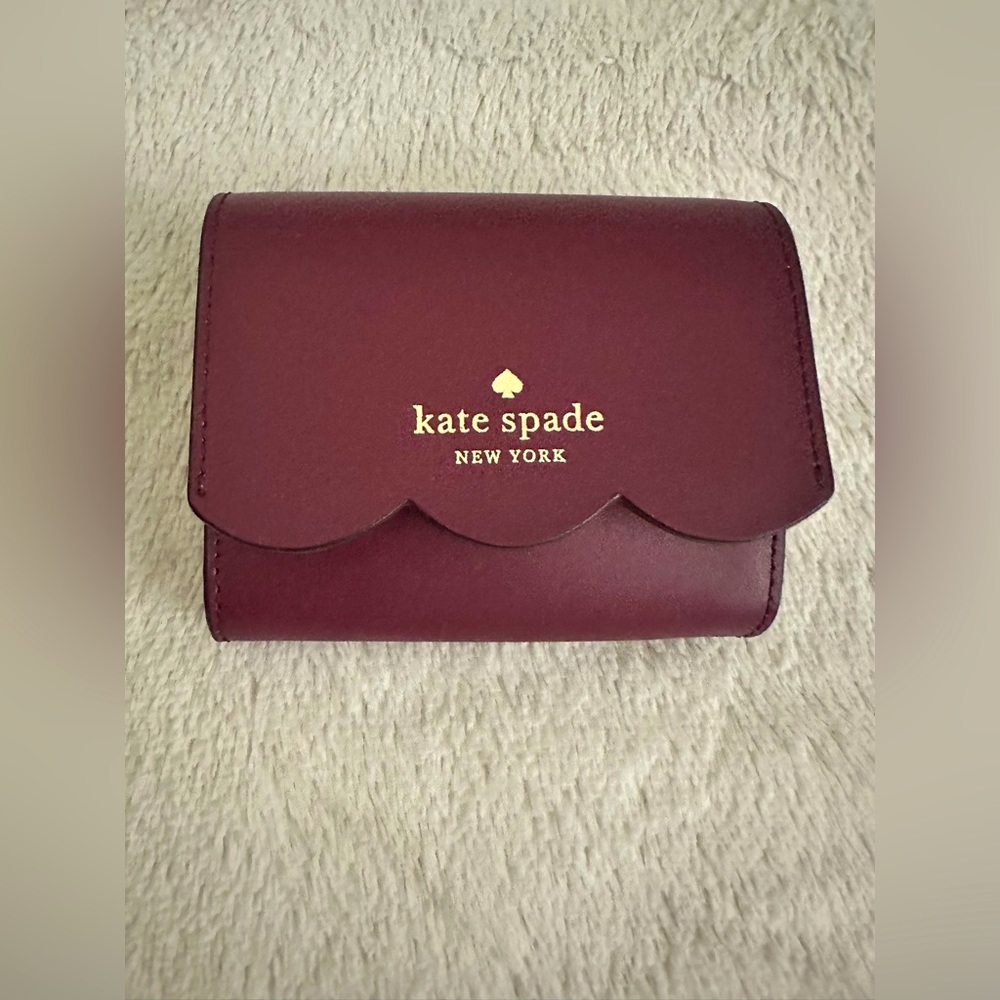 Kate Spade Gemma Small Flap Wallet Blackberry;
Women’s Size OS
($129 MSRP)